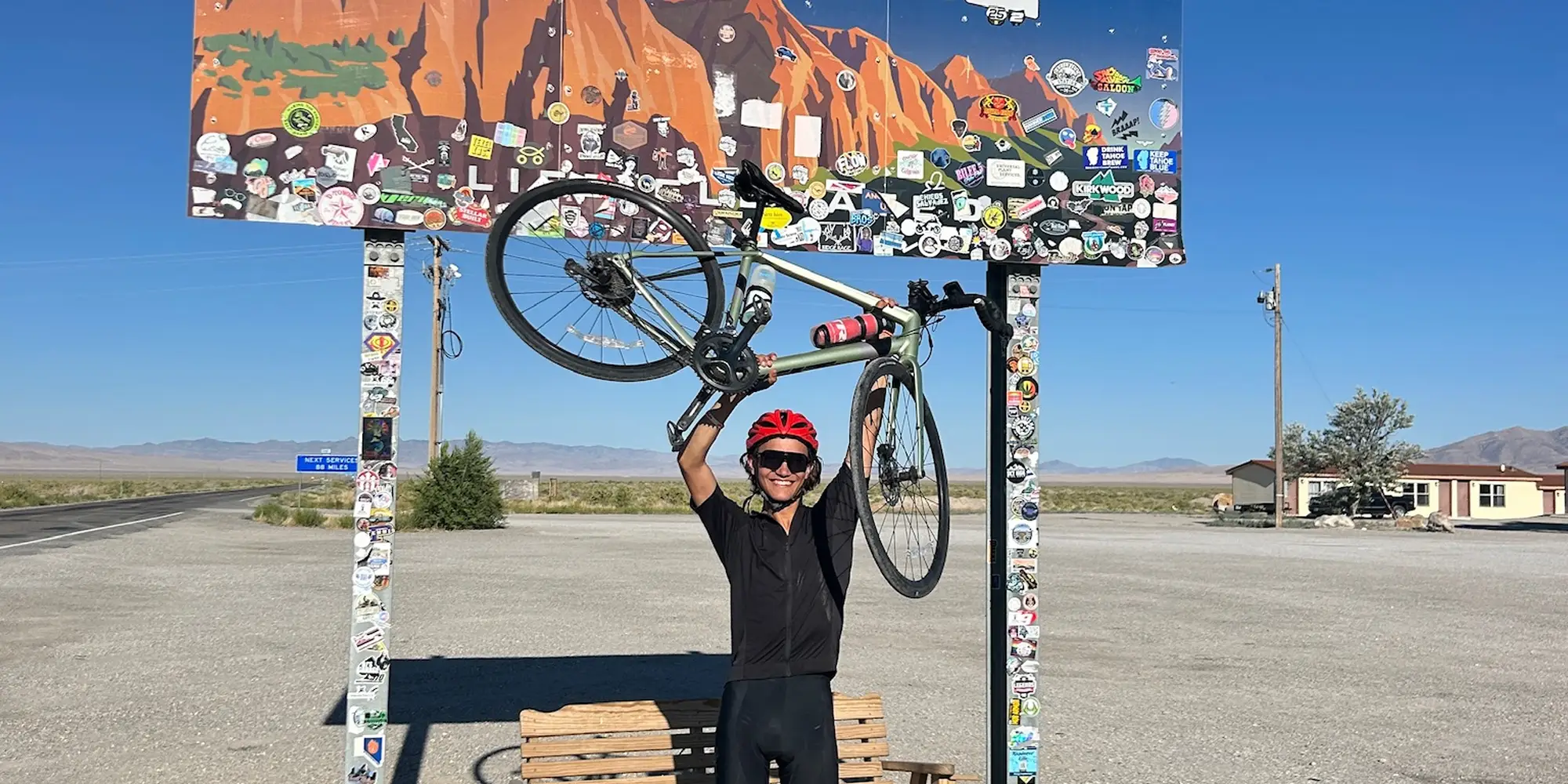 Ethan holds his bike