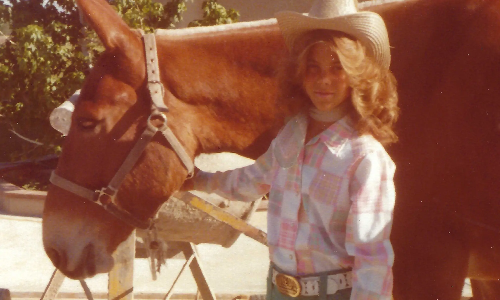 A file photo of young Tina with a horse