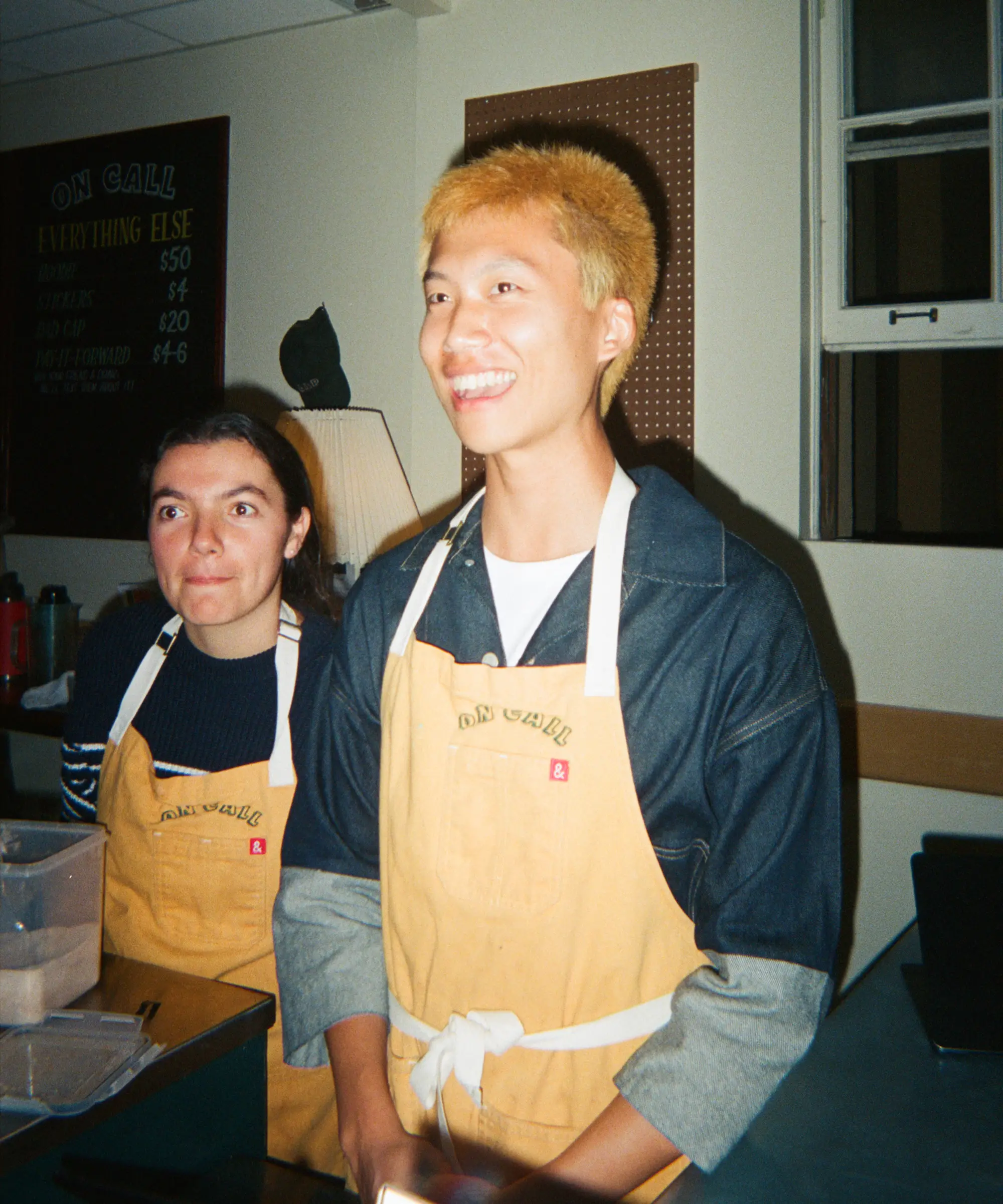 On Call Cafe barista smiling at camera