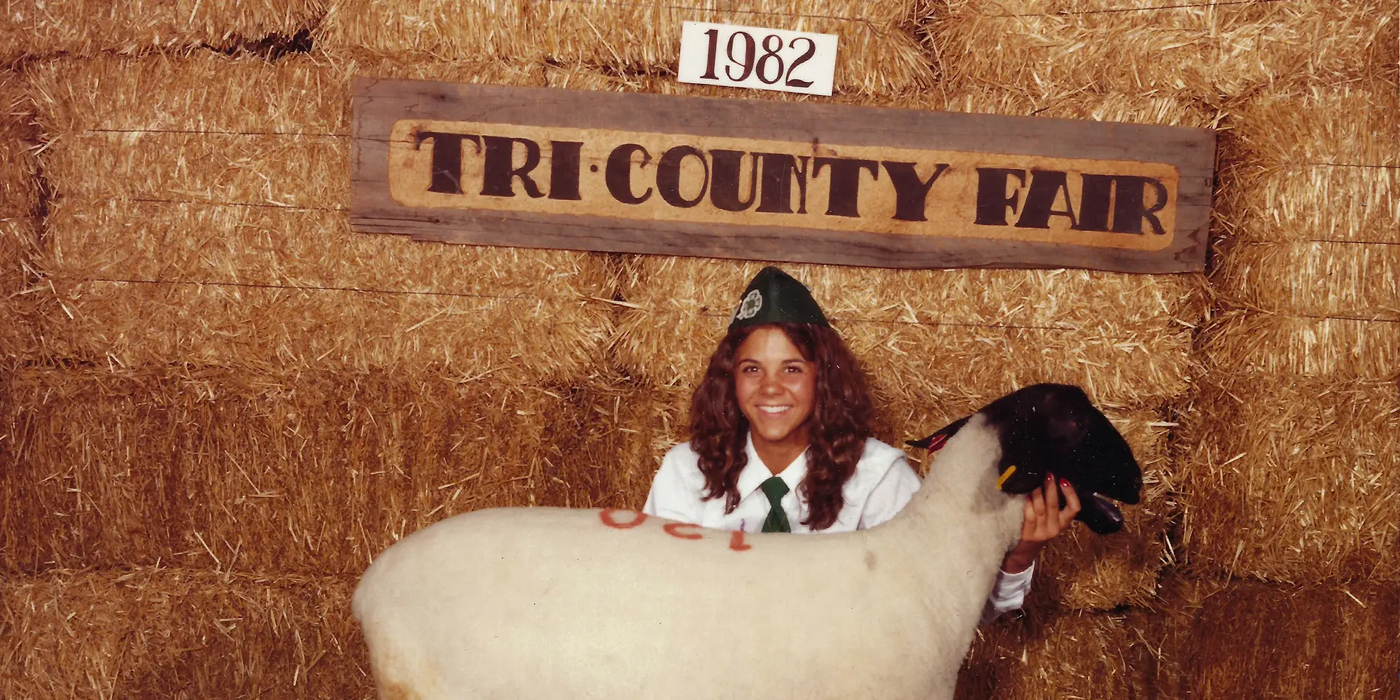 File photo of Tina at a county fair with a sheep 