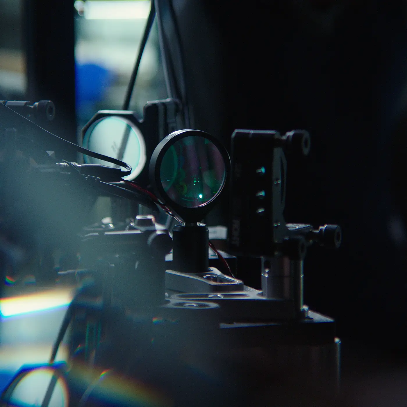 A closeup of several lenses in Monika’s lab