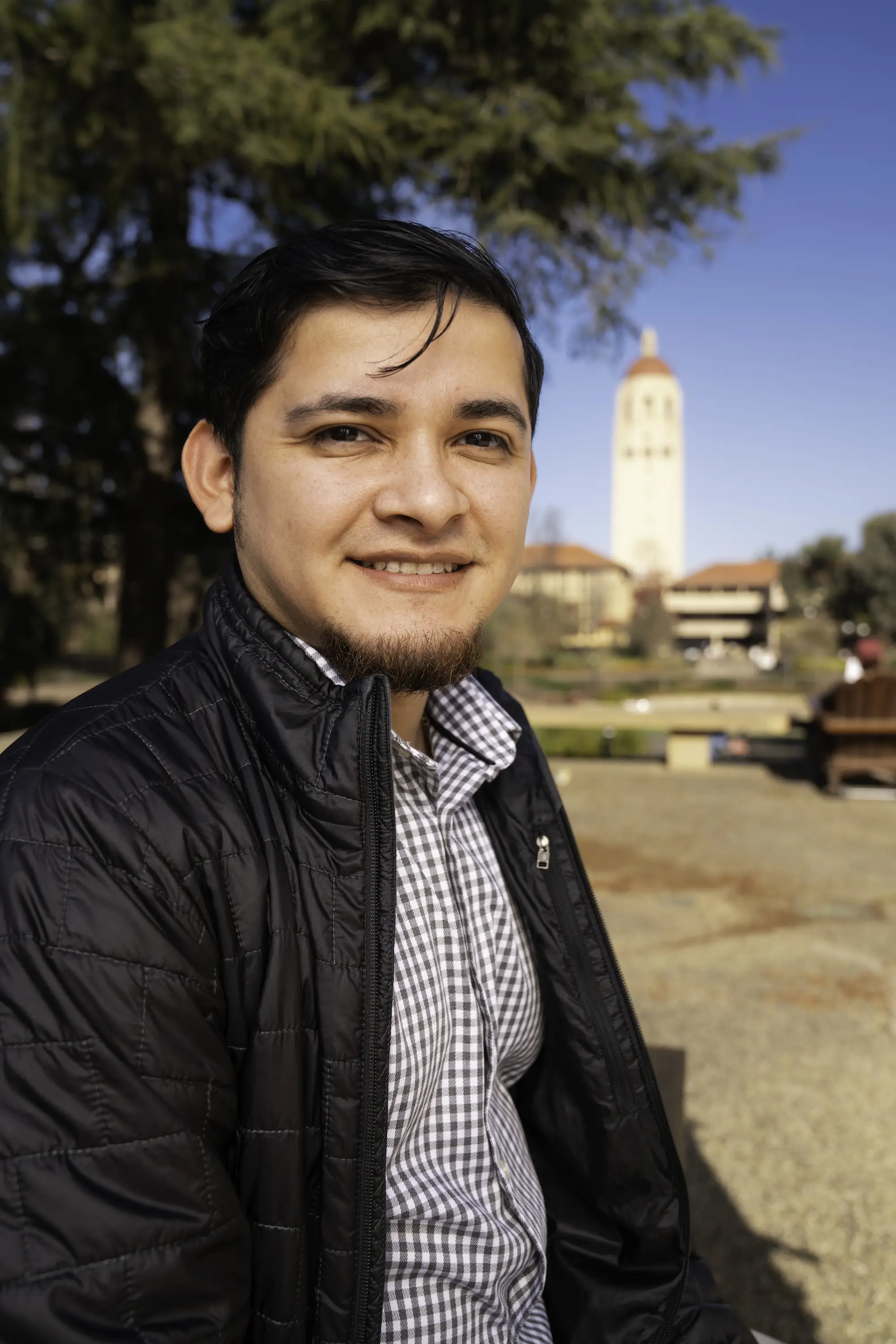 Juan smiles on campus