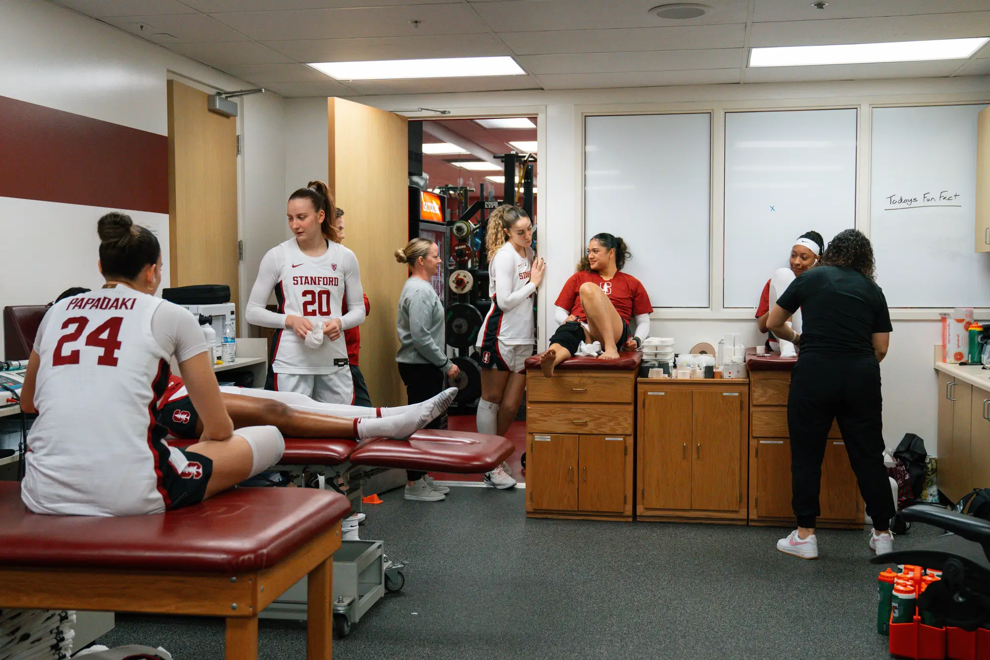 Players in the training room getting taped.