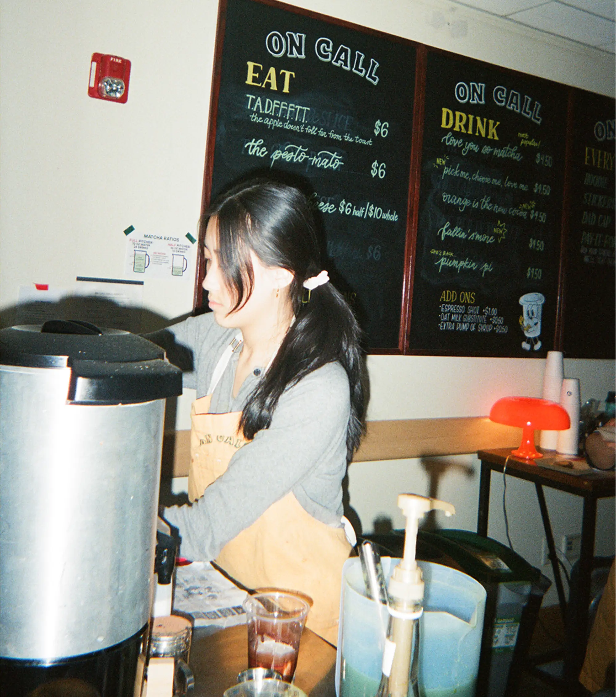 On Call Cafe barista pouring a cup of coffee