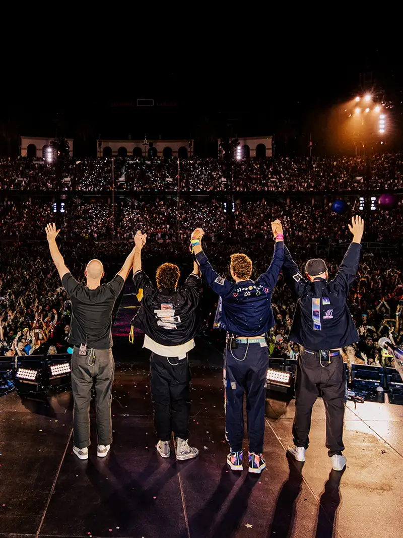 Coldplay performs at the sold out Stanford stadium.