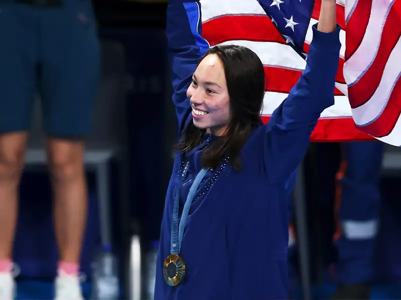 Stanford junior Torri Huske celebrates winning gold in the 100 butterfly.