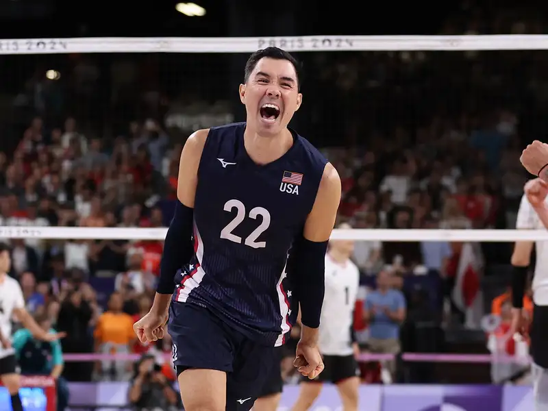 Stanford alumnus Erik Shoji competes for the U.S. men's volleyball team in Paris.