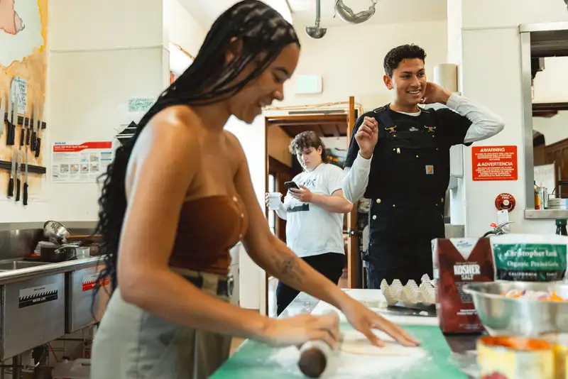 Students baking together in large kitchen