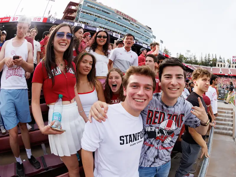 Students cheering at a sporting event