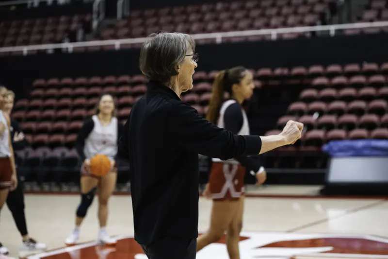 Tara coaches players at practice