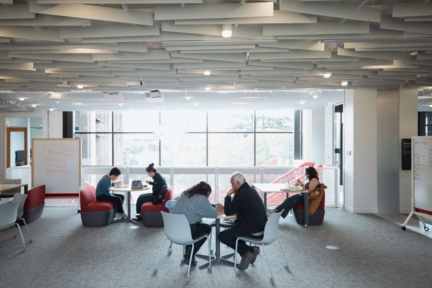 A group of people in a gathering space in CoDa