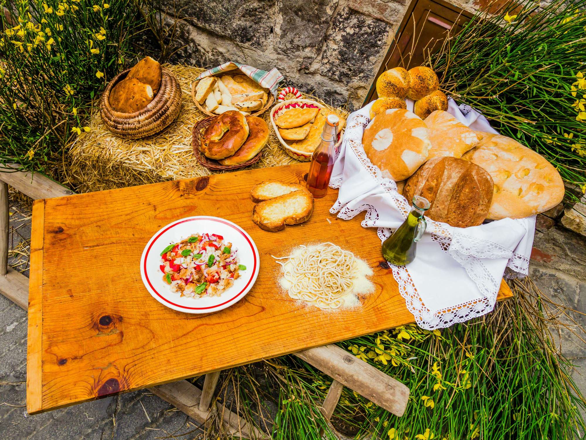 Rustic wooden board full of typical tuscan food, italian countryside