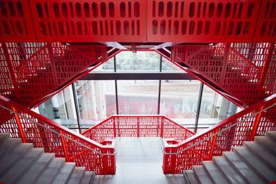 A red staircase in CoDa building