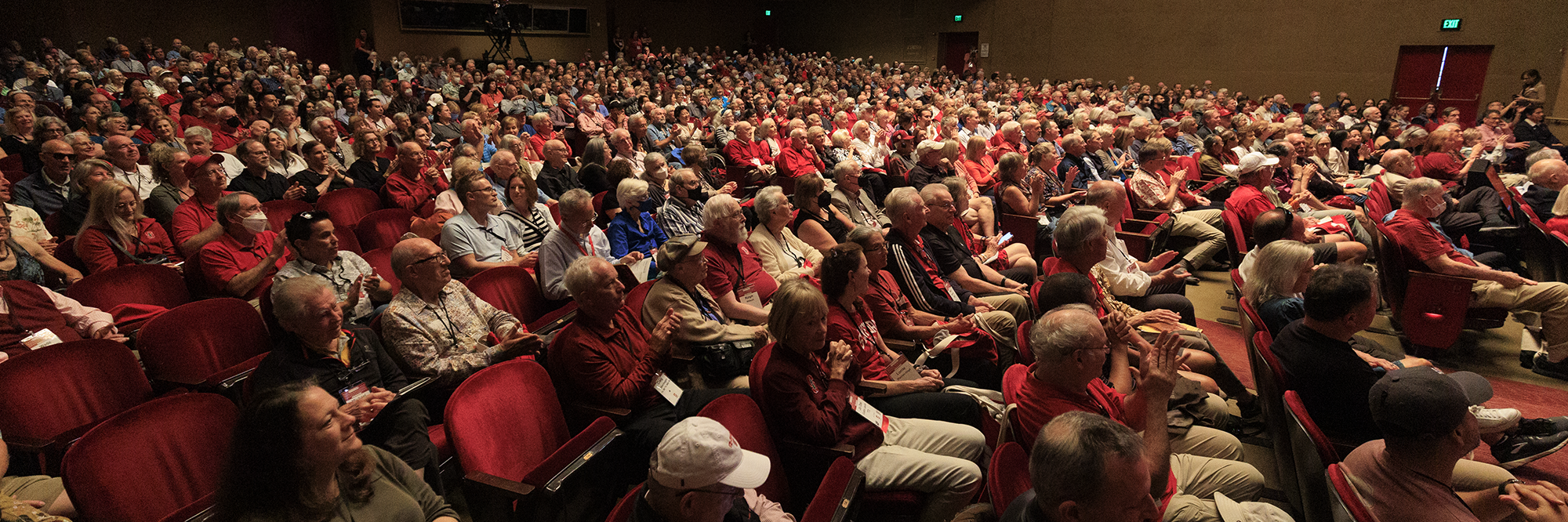 A crowd seated in an auditorium